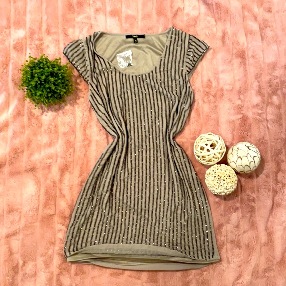 Sequin mini naked dress with cap sleeves.